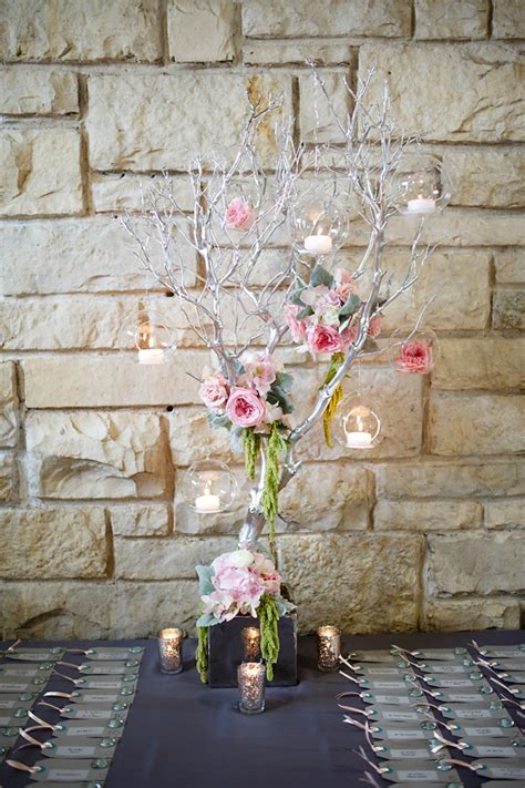 Pink escort branch centeprieces with hanging candles  Today